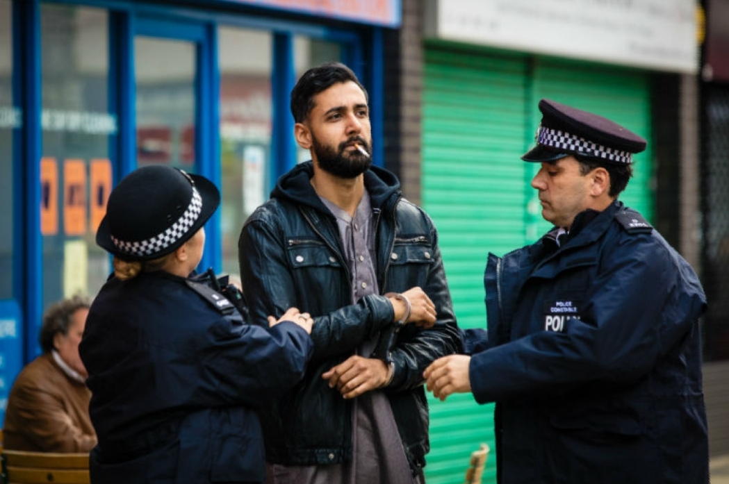 《告密者》剧照第3张图片